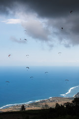 Paragliders takeoff