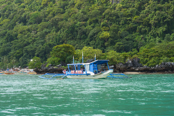 Naklejka premium Bangka boat in El Nido bay, Palawan, Philippines