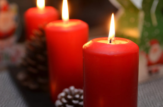 Christmas candle burning at night