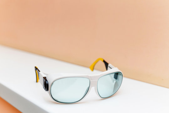 plastic protective work glasses in dentist office