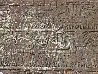 Scupted stone statue of Khmer  at Angkor Wat in Asia  