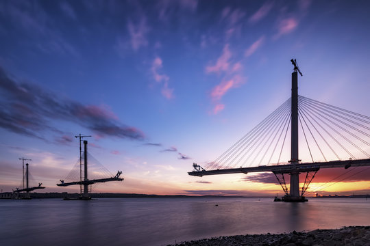 Scotland, Construction of the Queensferry Crossing Bridge at sunset