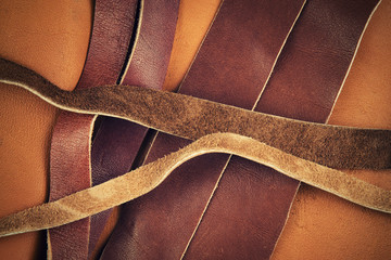 cut brown leather straps