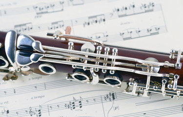 Detail of an clarinet on some musicnotes