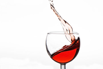 wine splash in a glass