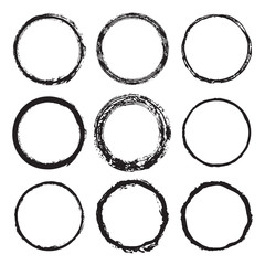 Vector set of round frames, painted with an ink brush. Black grunge frame with rough edges isolated on white background. A collection of circles dirty silhouettes