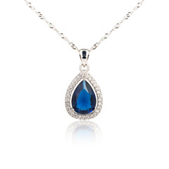 Sapphire pendant isolated on white