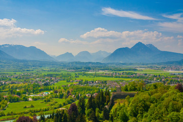 Panoramic view of the Salzburg basin with the alps in the background. 
