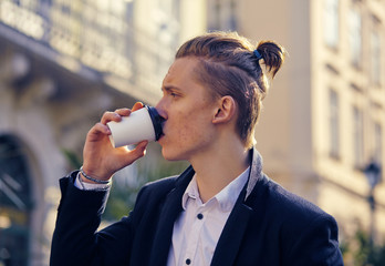 Man drinking a cup of coffee