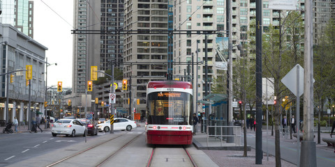View of tram on tramway in the city, Toronto, Ontario, Canada © klevit