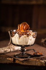 creamy spoon dessert with almonds