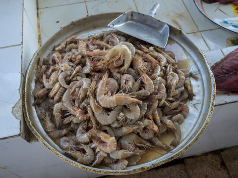 Oman, Barka, Fish market, fresh row shrimps on tray