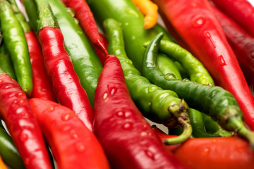 Mexican spicy peppers of long shape. Background of chili peppers