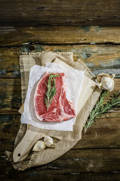 Row beefsteak with rosemary