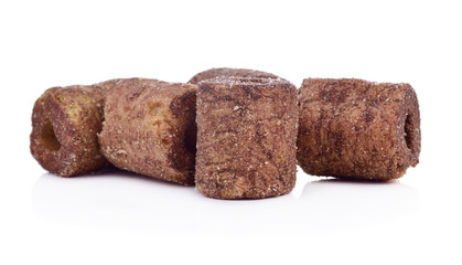 Crunchy corn and chocolate snacks on a white background.