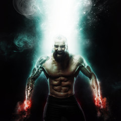 Fototapeta na wymiar Sport and motivation wallpaper on dark background. Power athletic guy bodybuilder. Fire and energy