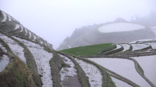 Looking down a foggy Ping an slope