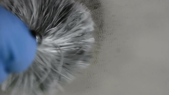 Fingerprints, brush develops latent print on glass