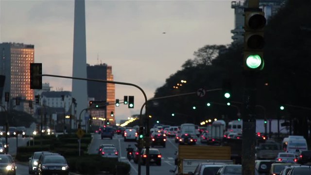 Traffic in Buenos Aires, at dusk. 9 de Julio Avenue. 
