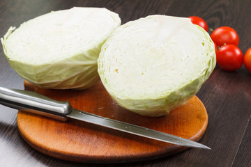 Cutting cabbage on a board