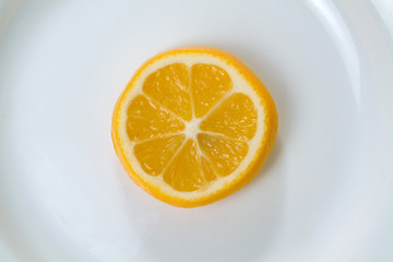 Oranges . Healthy fresh tasty food . Yellow Lemons . Slices of delicious juicy lemon , closeup .