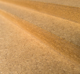 The fibrous surface of the MDF.