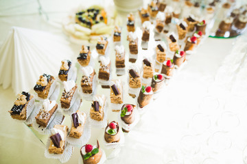 Different kinds of baked sweets on a buffet