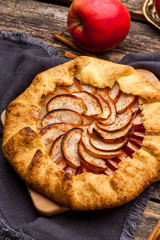 Naklejka na ściany i meble Baked galette or open pie with apples on the table