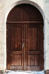 Fototapeta na wymiar Old wooden closed door