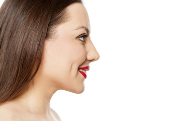 profile of beautiful woman with makeup on white background