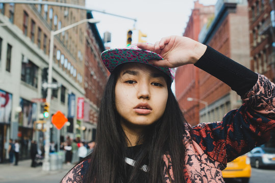 Portrait Of Young Woman In The City