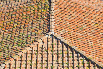 Old traditional tuscany terracotta roof covering (Tuscany - Italy) seen from above