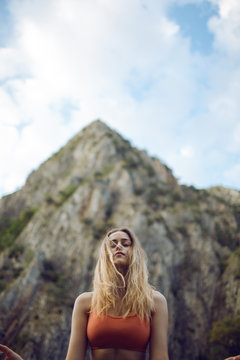 Woman Meditating  in nature