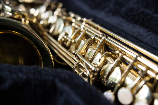 Golden saxophone in its case