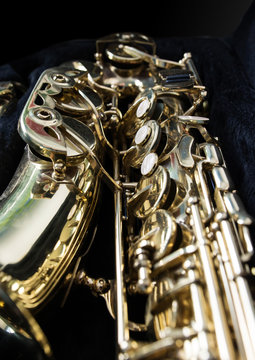 Golden saxophone in its case