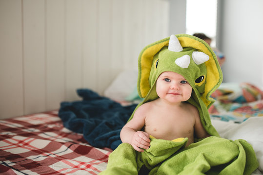 Baby in a hooded towel