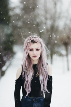 Snowy portrait of a beautiful young woman