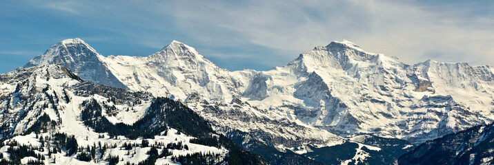 Three dominant peaks of Bernese Alps in Switzerland
