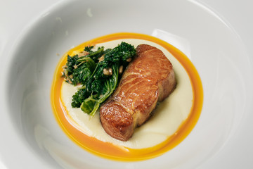 Baked Salmon Steak with Spinach and Lemon Slice