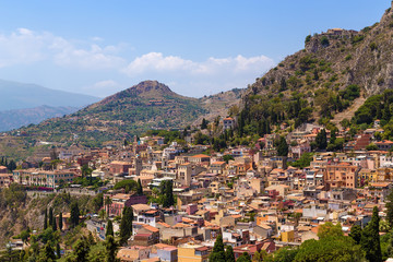 Fototapeta na wymiar Taormina, Sicily, Italy. The historical center of the city on the slope of the mountain