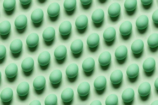 Green Easter eggs background