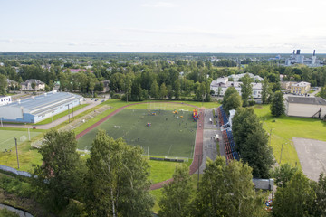 sports competitions on the sports field which is located in a green city