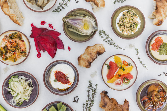Mediterranean small fresh tapas dishes with bread and beetroot