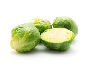 Boiled Brussels sprout three heads and one half isolated on white background.