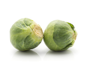 Naklejka premium Brussels sprout isolated on white background two heads fresh raw.