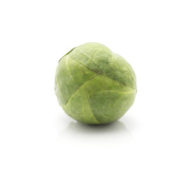 Raw Brussels sprout one head isolated on white background.