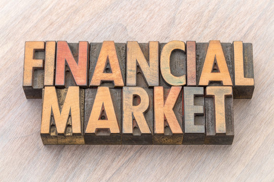 financial market word abstract in wood type