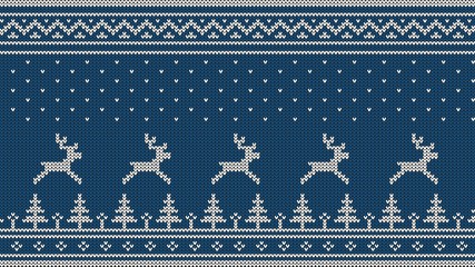 Knitted Scandinavian pattern with deer, firs, ornaments and falling snow. White on a blue background.