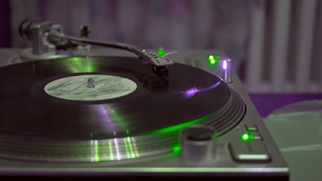 close up of turntable playing record	