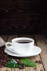 Cup of coffee on wooden rustic table